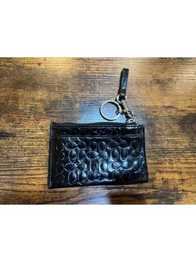 Coach Signature Embossed Patent Leather Mini Skinny